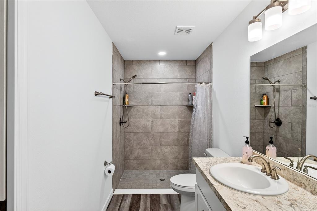 14862 Southwest 79 Terrace Road Dunnellon, FL 34432 - Photo 14 of 28 a bathroom with a sink and a mirror