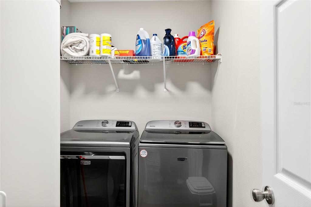 14862 Southwest 79 Terrace Road Dunnellon, FL 34432 - Photo 15 of 28 a utility room with dryer and washer