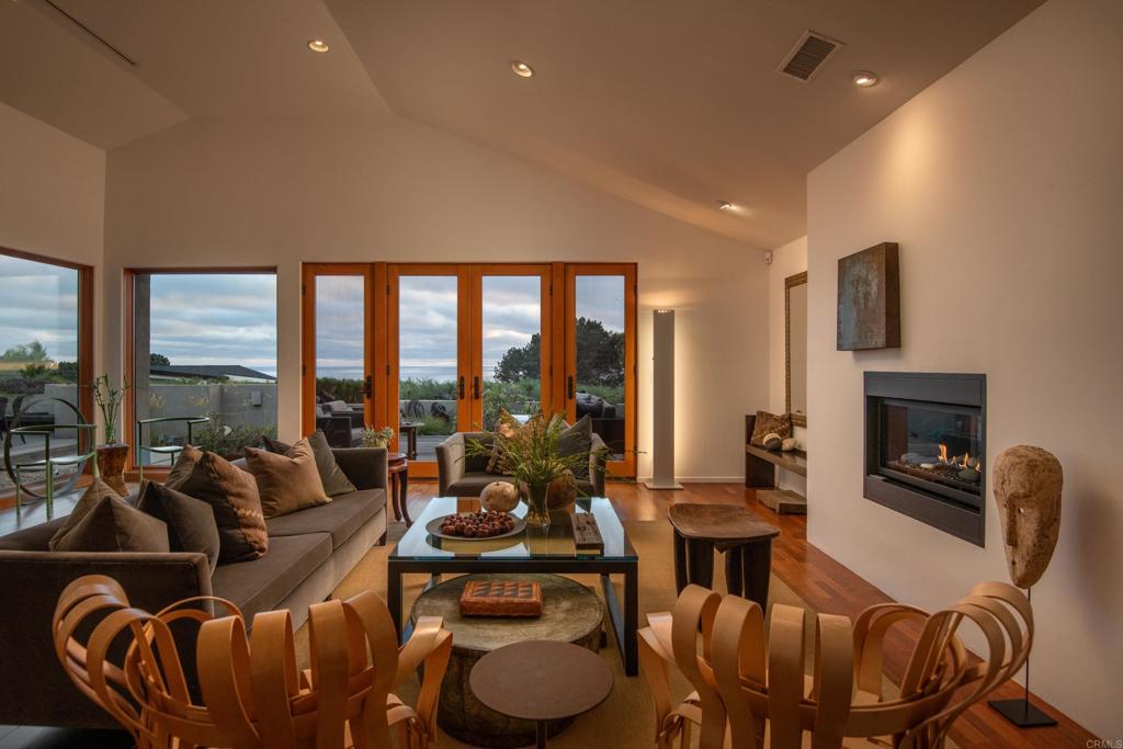 14014 Rue D Antibes Del Mar, CA 92014 - Photo 11 of 46 a living room with furniture and a fireplace