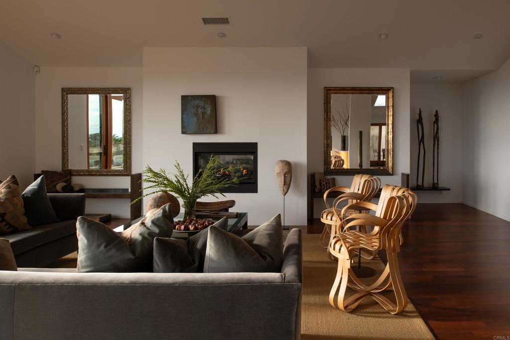 14014 Rue D Antibes Del Mar, CA 92014 - Photo 12 of 46 a living room with furniture and a fireplace