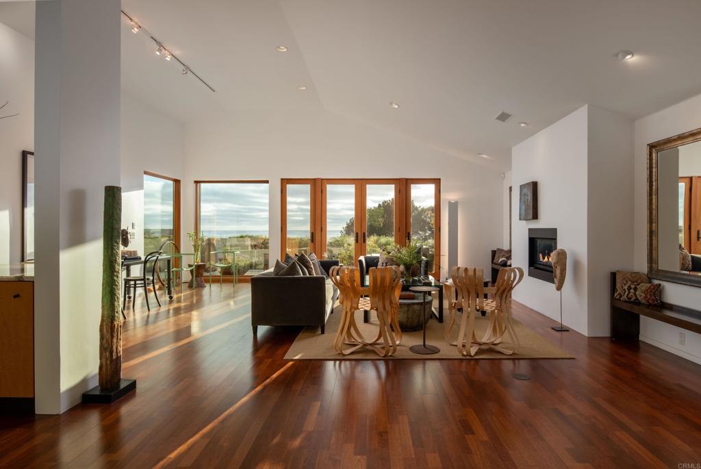 14014 Rue D Antibes Del Mar, CA 92014 - Photo 14 of 46 a living room with furniture floor to ceiling window and wooden floor