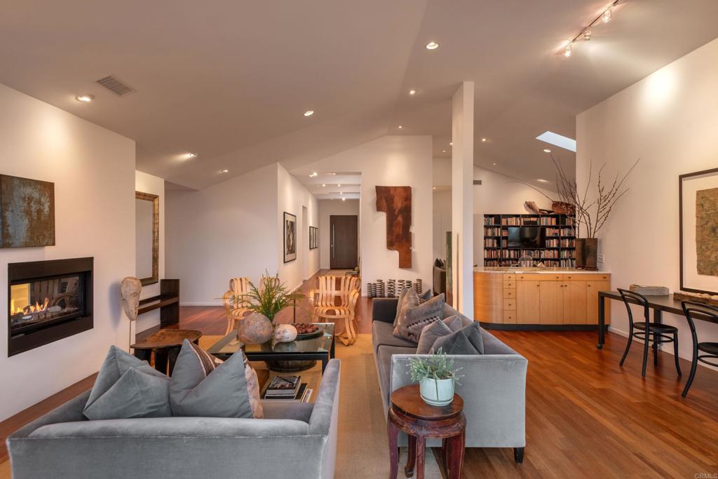 14014 Rue D Antibes Del Mar, CA 92014 - Photo 15 of 46 a living room with fireplace furniture and a wooden floor