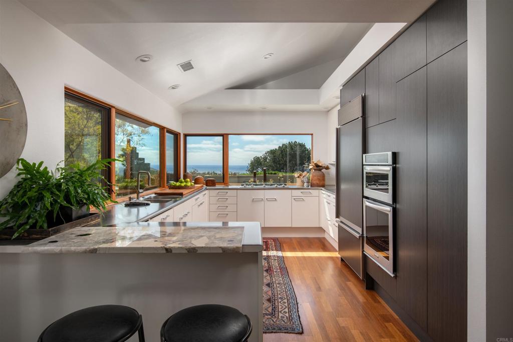 14014 Rue D Antibes Del Mar, CA 92014 - Photo 18 of 46 a view of living room with furniture and large window