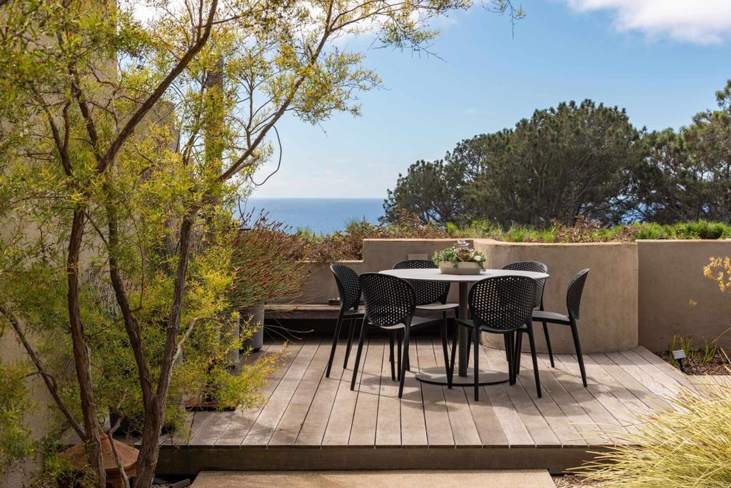 14014 Rue D Antibes Del Mar, CA 92014 - Photo 36 of 46 a view of a terrace with furniture and a table
