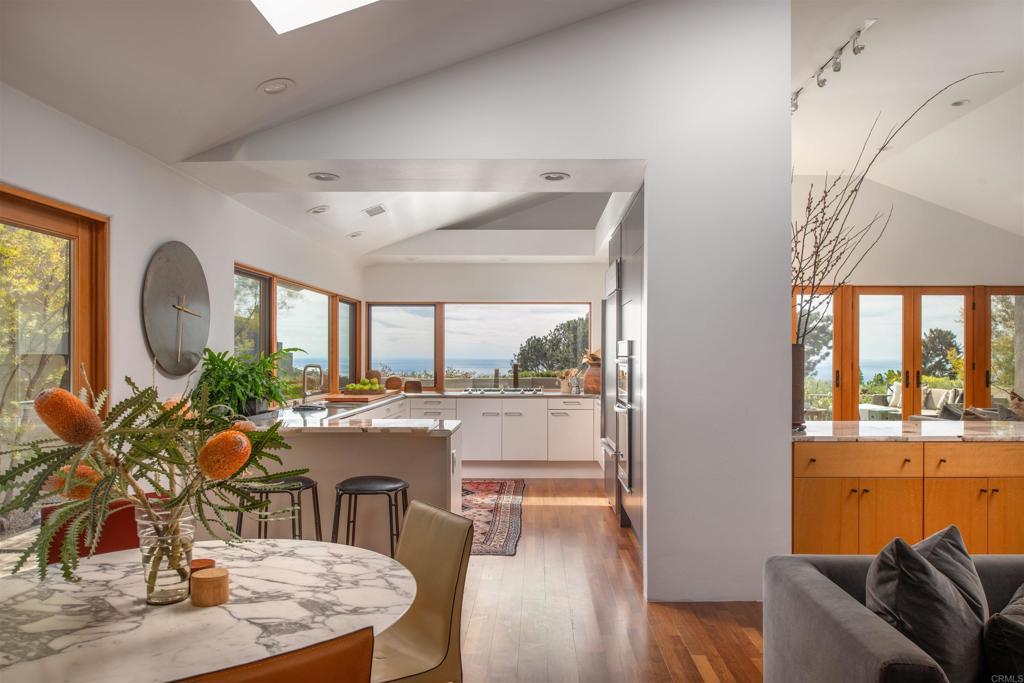 14014 Rue D Antibes Del Mar, CA 92014 - Photo 4 of 46 a living room with furniture and a large window