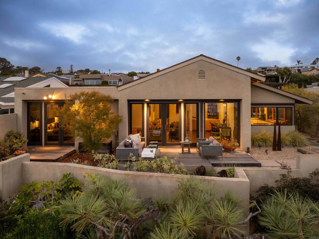 14014 Rue D Antibes Del Mar, CA 92014 - Photo 43 of 46 a view of a house with backyard outdoor seating area and furniture