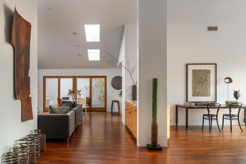 14014 Rue D Antibes Del Mar, CA 92014 - Photo 8 of 46 a living room with furniture and a large mirror next to a window