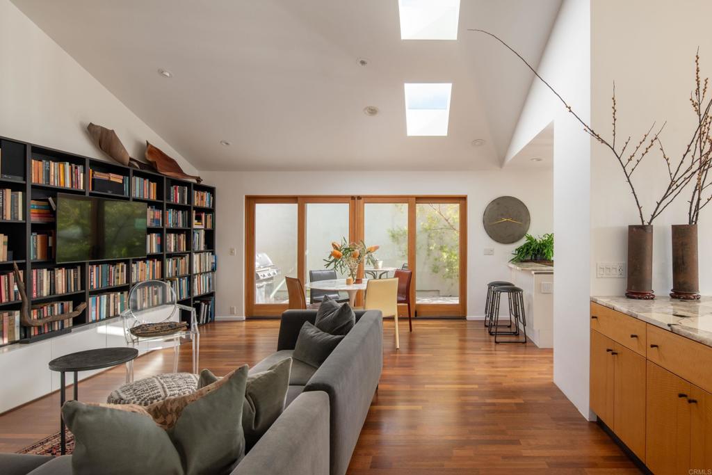 14014 Rue D Antibes Del Mar, CA 92014 - Photo 9 of 46 a living room with furniture large window and flat screen tv
