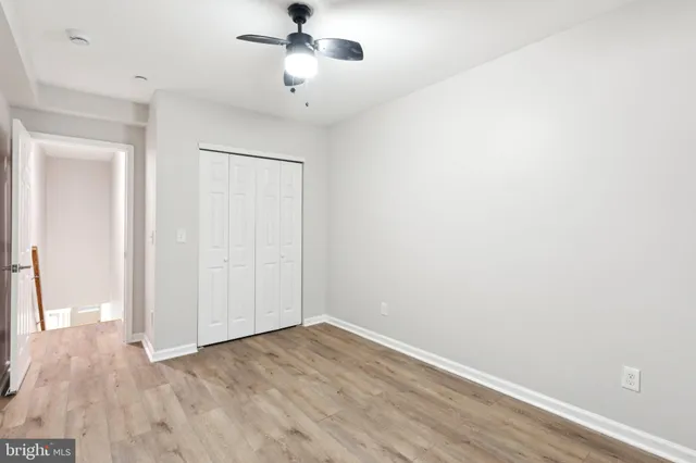 a view of balcony with wooden floor