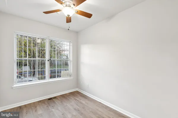 a bathroom with a toilet a sink and shower