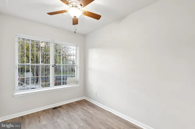 a bathroom with a toilet a sink and shower