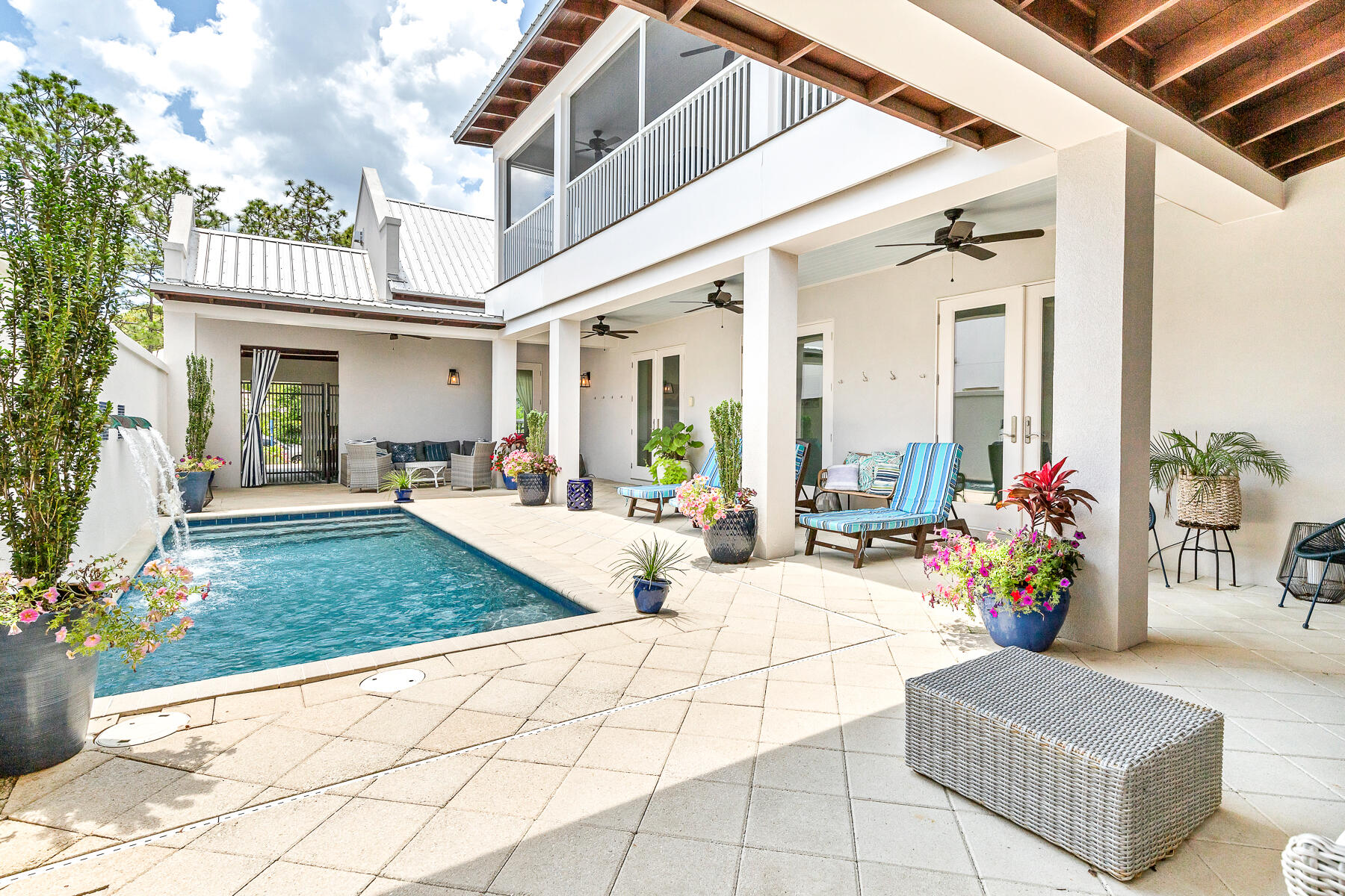 75 Barcelona Avenue Santa Rosa Beach, FL 32459 - Photo 13 of 41 a view of living room with patio furniture and potted plants