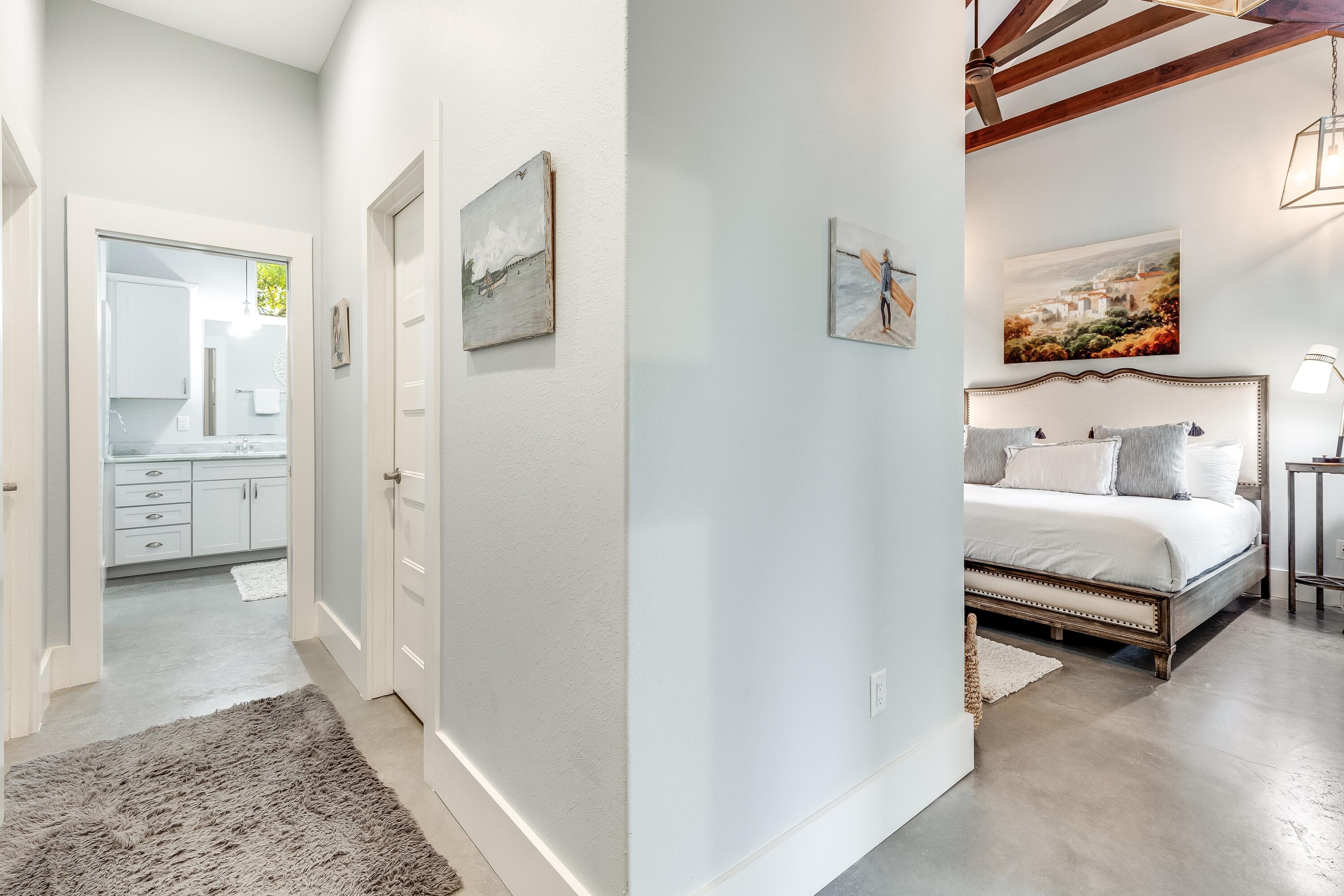 75 Barcelona Avenue Santa Rosa Beach, FL 32459 - Photo 16 of 41 a bedroom with a bed and a view of bathroom