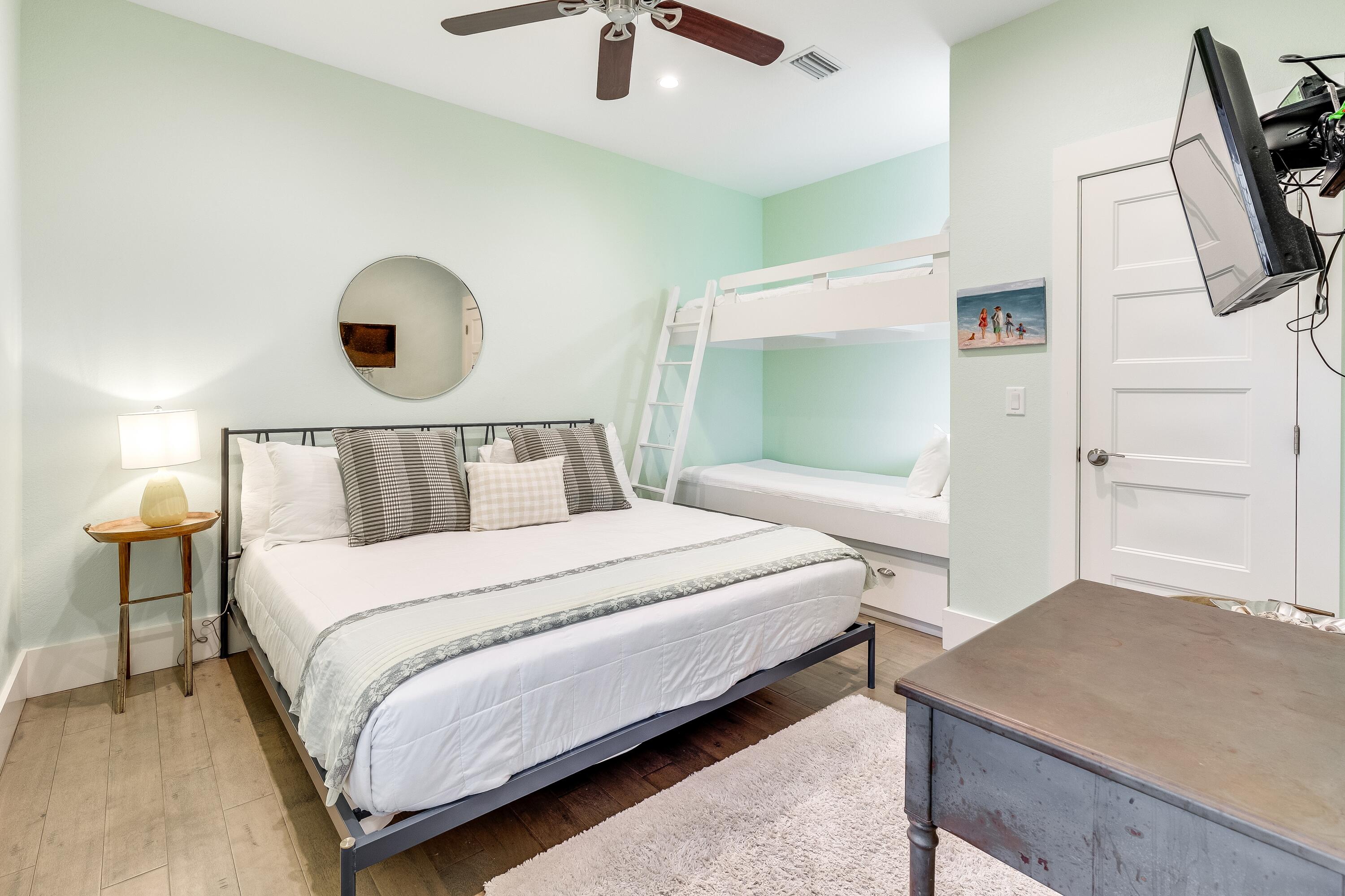 75 Barcelona Avenue Santa Rosa Beach, FL 32459 - Photo 23 of 41 a bedroom with a bed and a flat tv screen