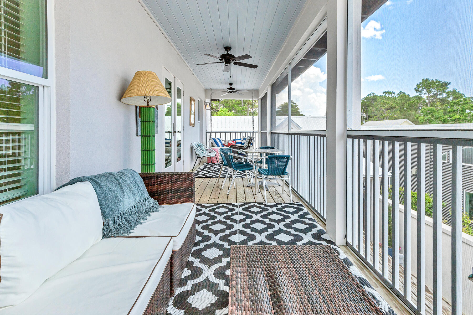75 Barcelona Avenue Santa Rosa Beach, FL 32459 - Photo 27 of 41 a living room with furniture and a table
