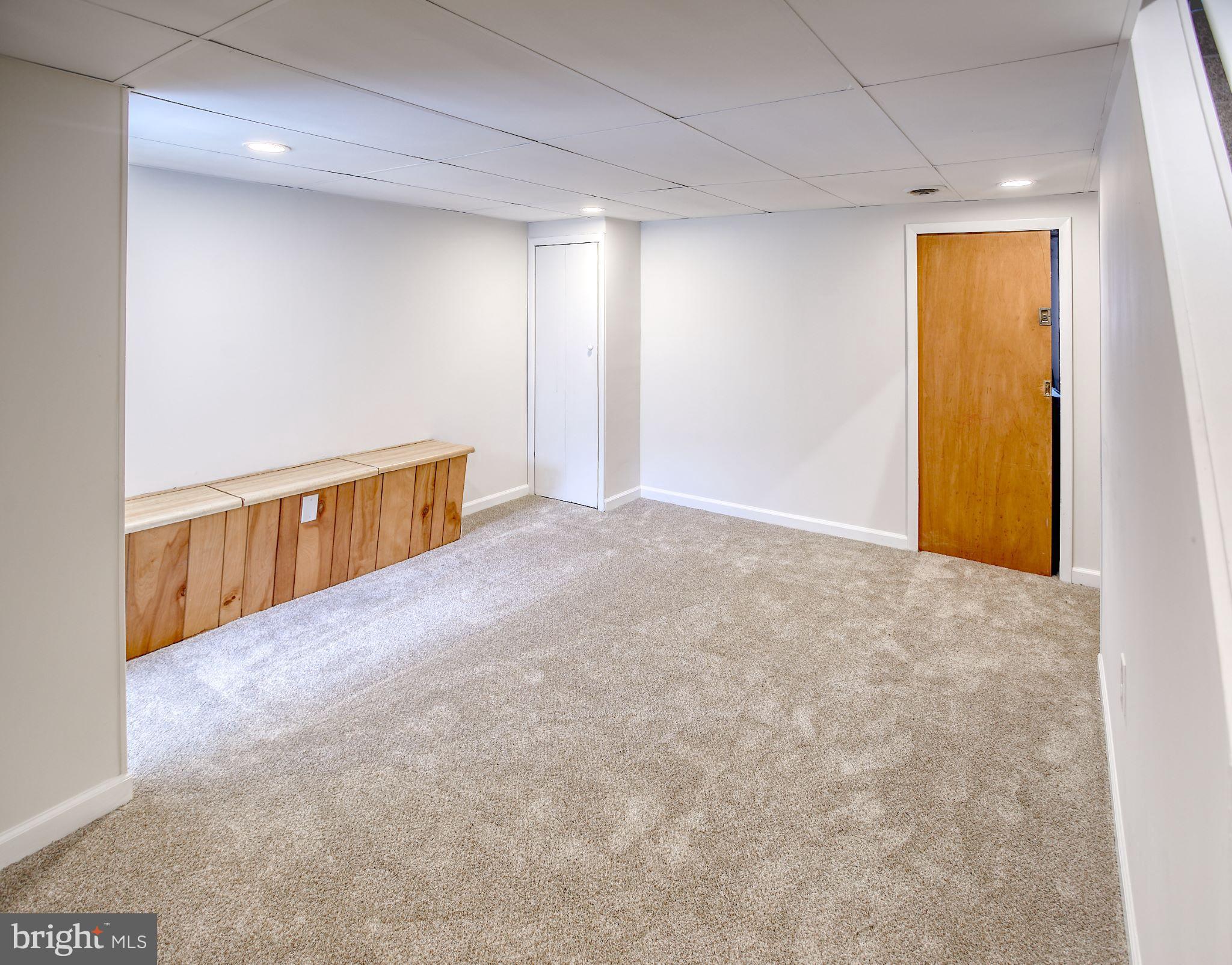 1029 Stamford Road Baltimore, MD 21229 - Photo 14 of 17 a view of an empty room with a window