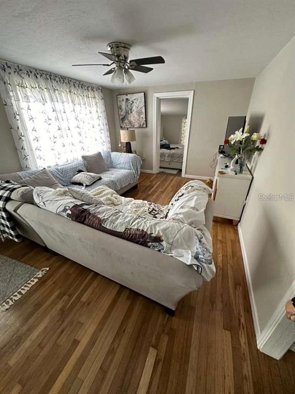 1509 Tate Street Cocoa, FL 32922 - Photo 7 of 12 a bedroom with a bed and window