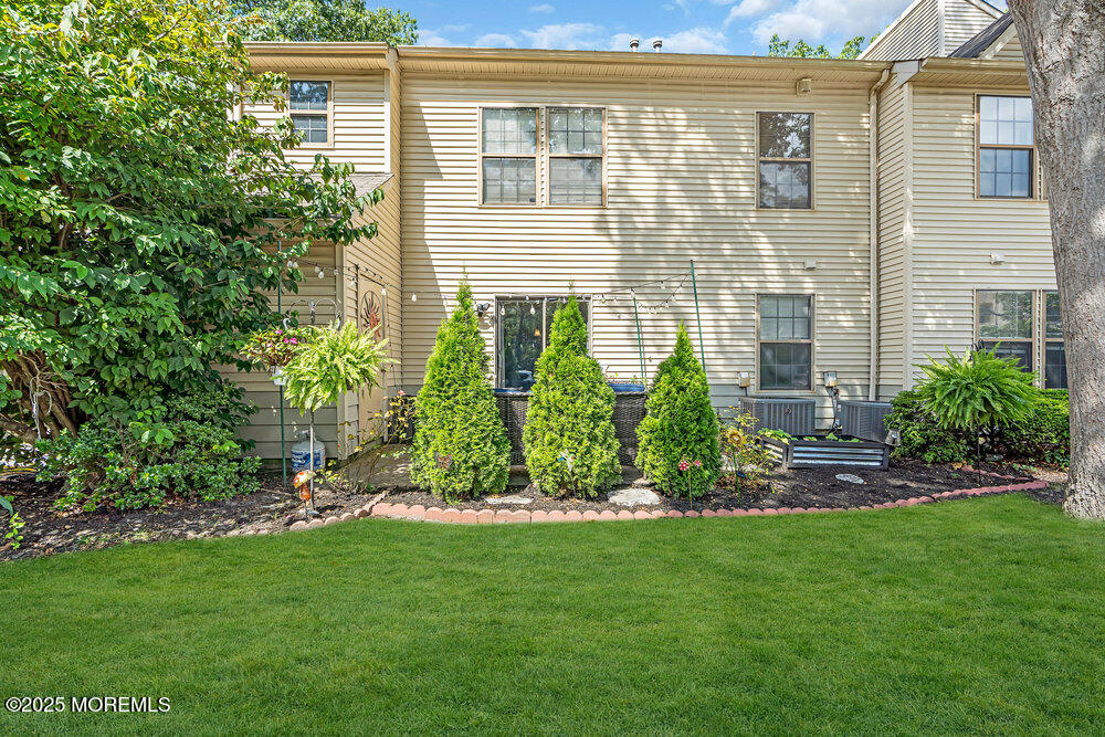 1506 Jasmine Court Jackson, NJ 08527 - Photo 17 of 20 a view of a back yard of the house