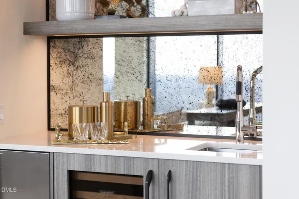 a bathroom with a double vanity sink and mirror