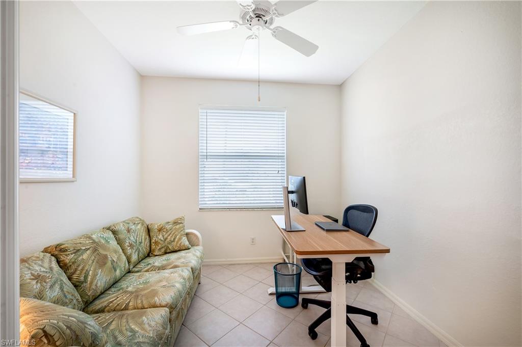 917 Fairhaven Court, Unit 29 Naples, FL 34104 - Photo 13 of 40 a work room with furniture and a window