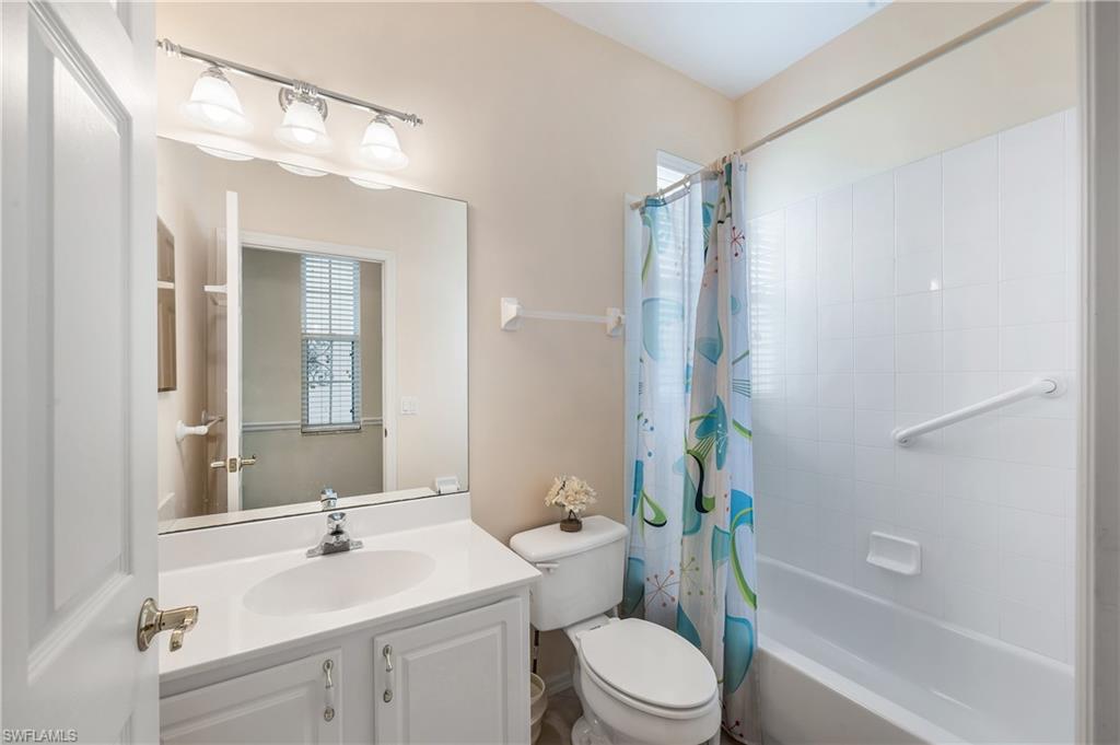 917 Fairhaven Court, Unit 29 Naples, FL 34104 - Photo 19 of 40 a bathroom with a sink a toilet a tub and shower