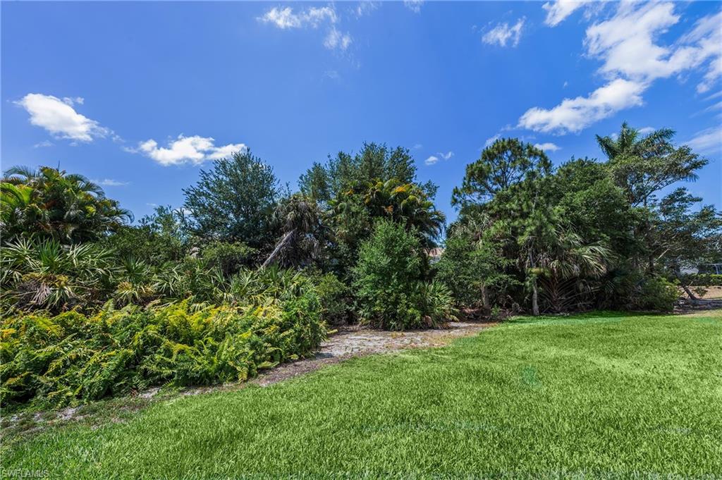 917 Fairhaven Court, Unit 29 Naples, FL 34104 - Photo 26 of 40 a view of a garden