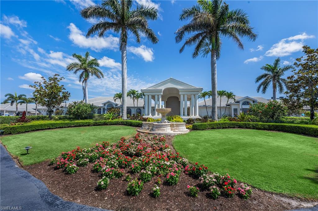 917 Fairhaven Court, Unit 29 Naples, FL 34104 - Photo 31 of 40 a view of a garden with palm trees