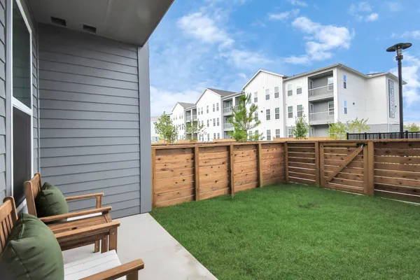 a view of a terrace with chairs