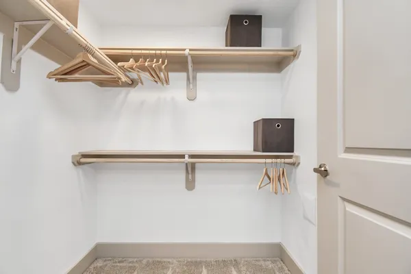 a view of a room with racks on the wall