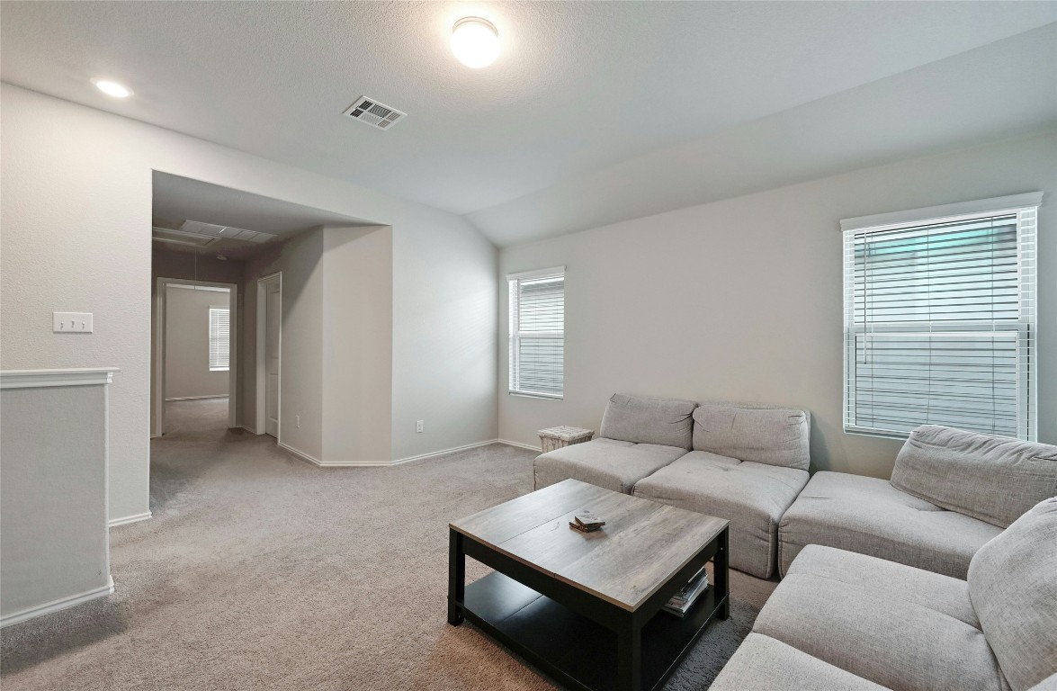 100 Comet Drive, Unit 1I Jarrell, TX 76537 - Photo 13 of 25 a living room with furniture