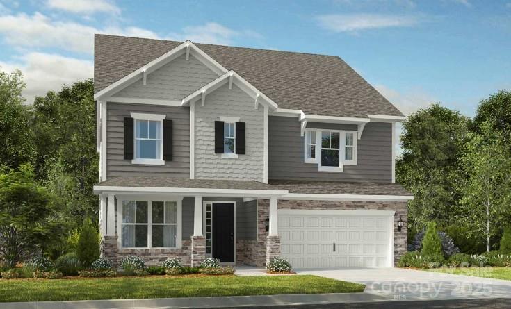 1590 Hubert Graham Way Tega Cay, SC 29708 - Photo 2 of 32 a view of a yard in front of house