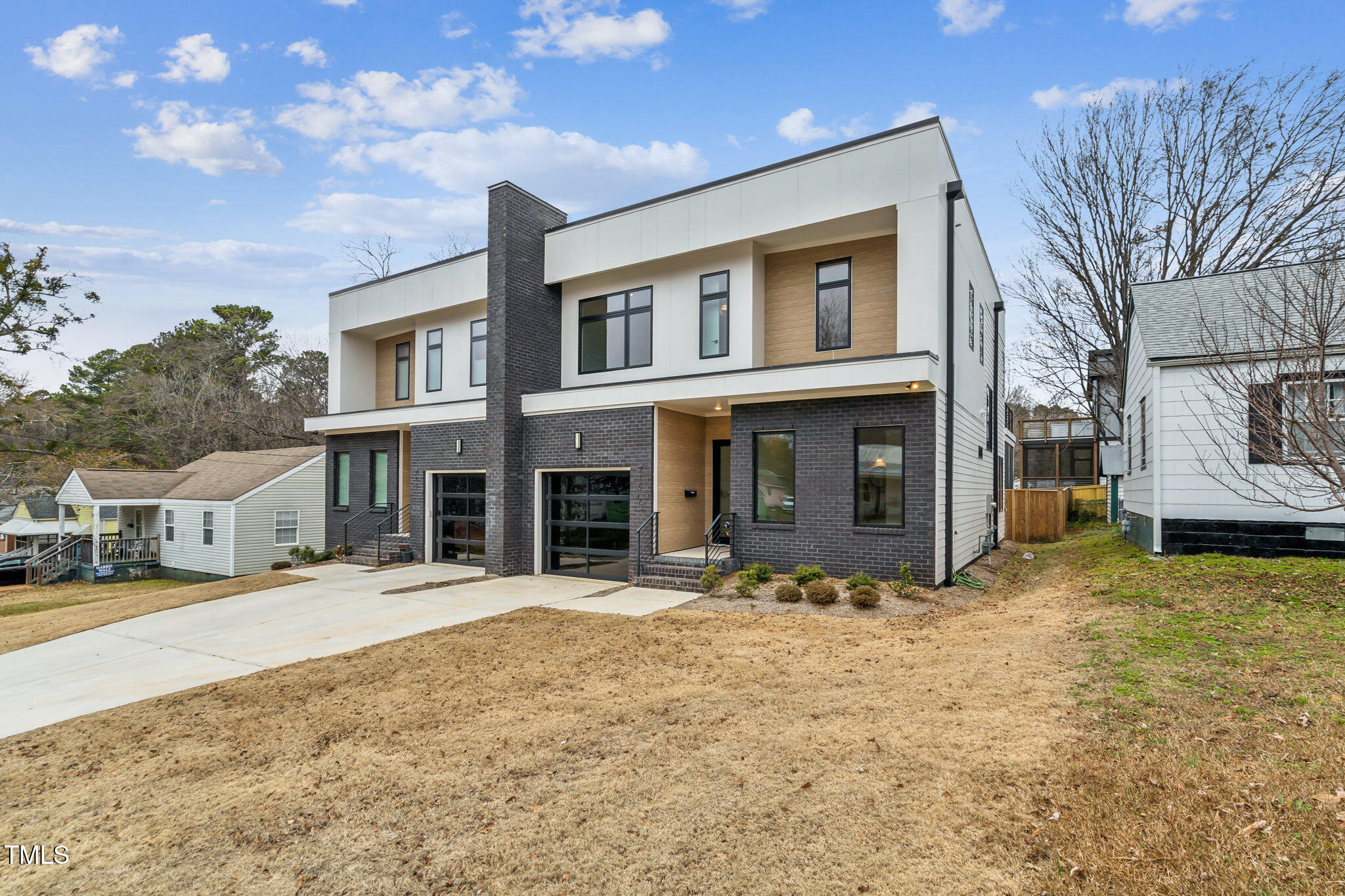 715 1/2 Van Buren Road Raleigh, NC 27604 - Photo 1 of 23 a view of a house with a yard in the background