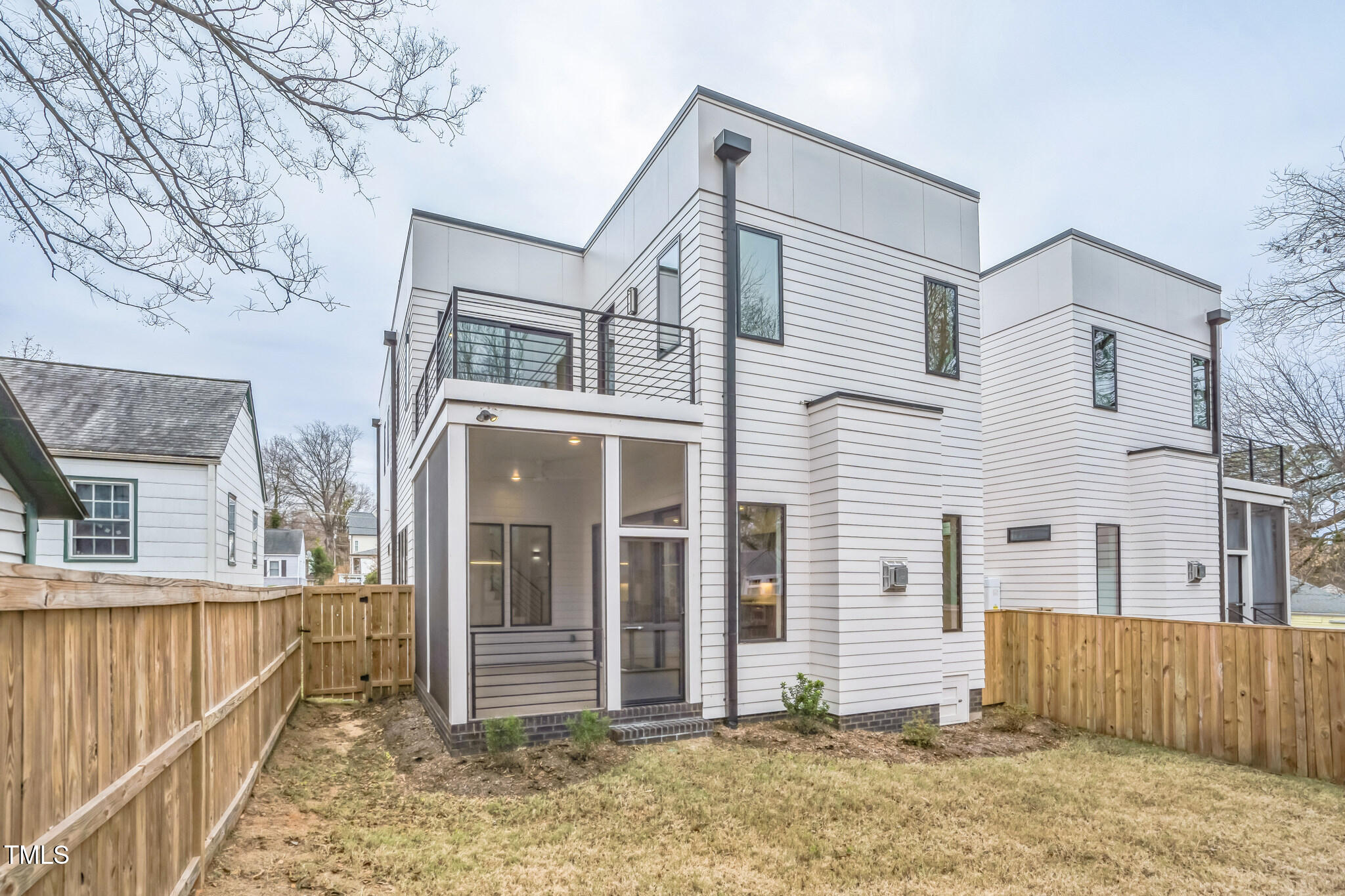 715 1/2 Van Buren Road Raleigh, NC 27604 - Photo 16 of 23 front view of a house with a fence