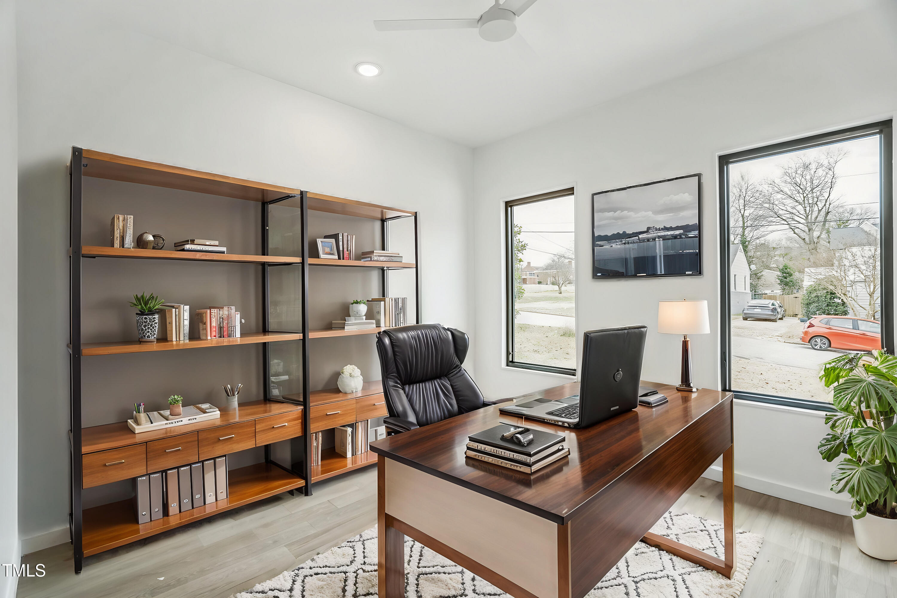715 1/2 Van Buren Road Raleigh, NC 27604 - Photo 6 of 23 a living room with furniture and a window