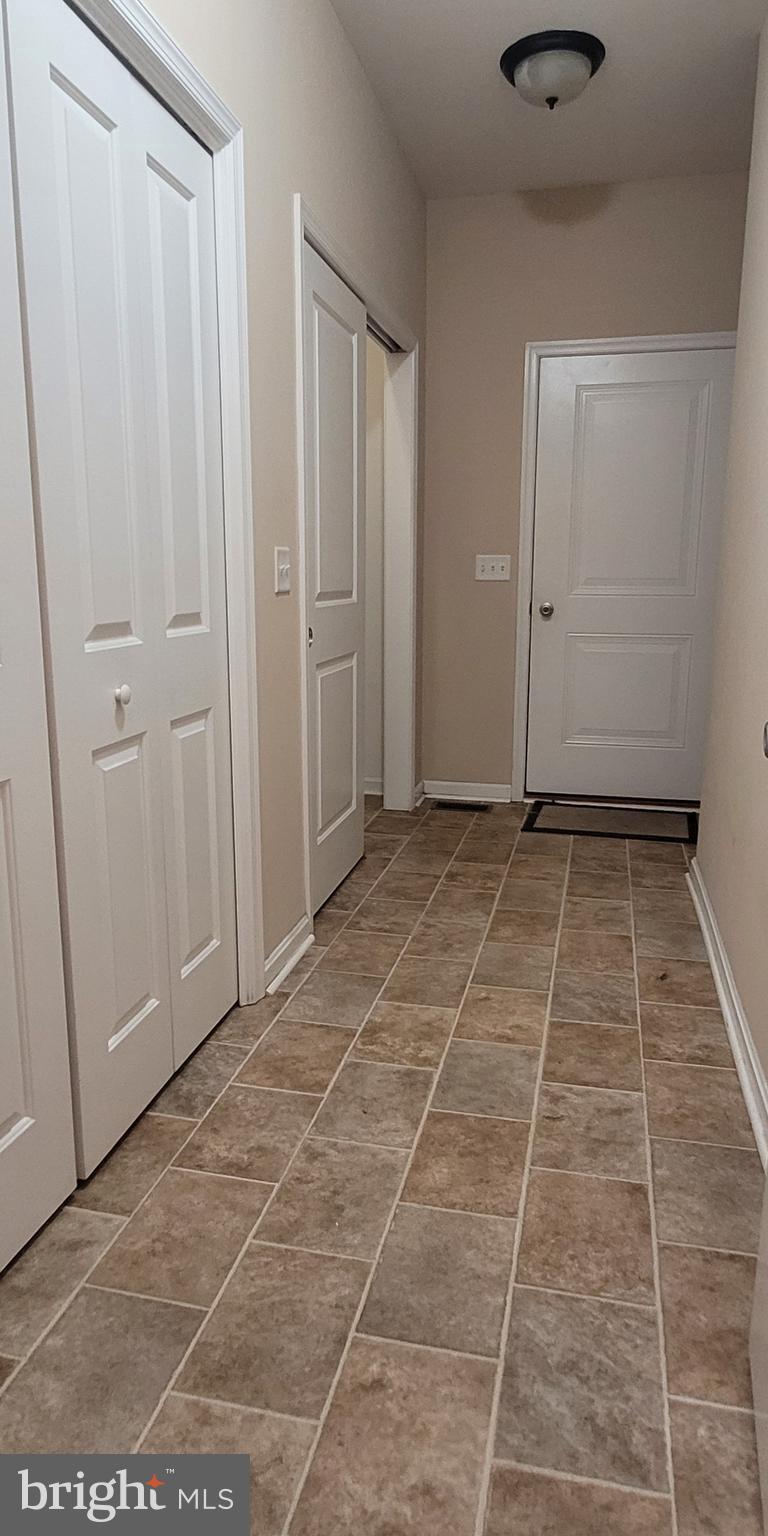68 Split Oak Drive Felton, DE 19943 - Photo 12 of 22 a view of a room with white tiles