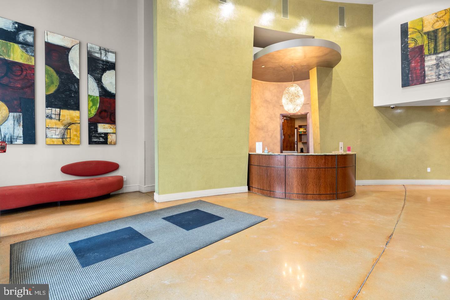 444 West Broad Street, Unit 401 Falls Church, VA 22046 - Photo 38 of 43 a bedroom with a bed and a potted plant