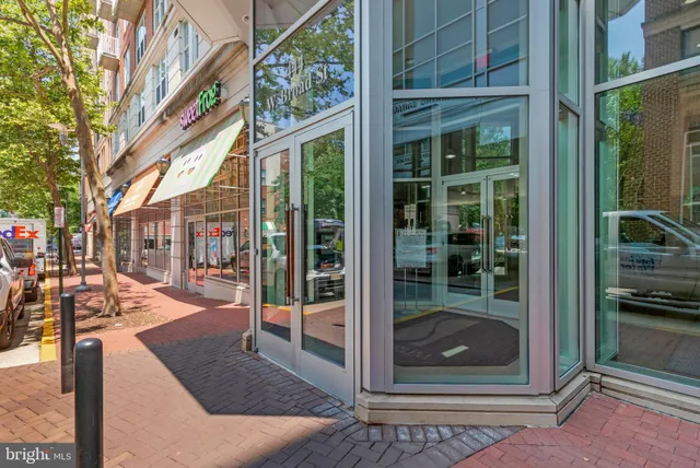 a front view of a building with a street