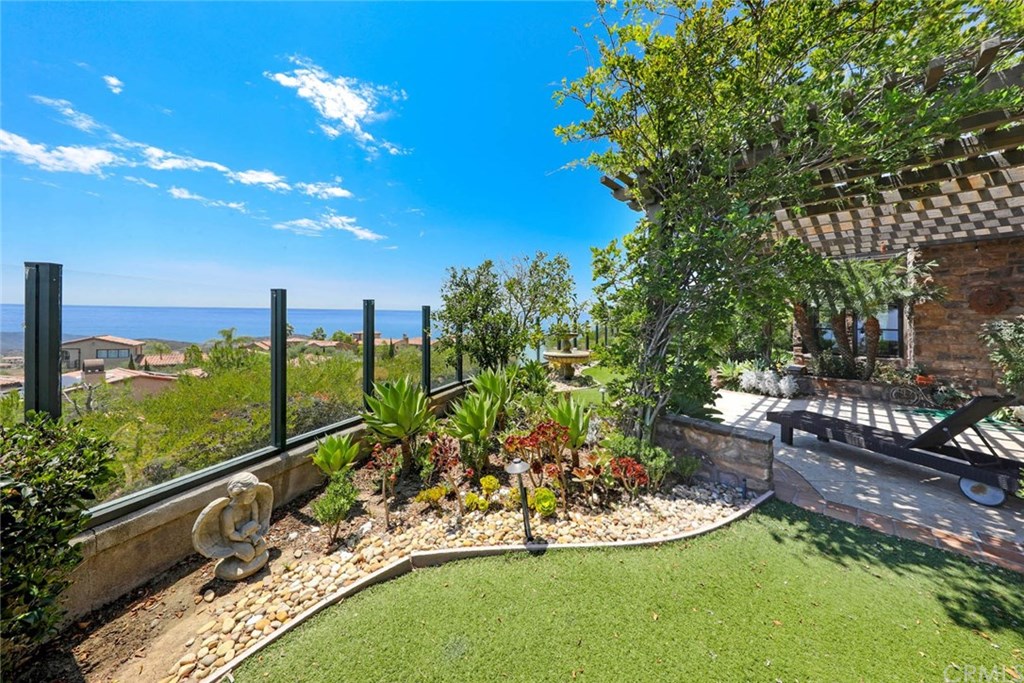 53 Overlook Drive Newport Coast, CA 92657 - Photo 5 of 28 Spectacular ocean/Catalina views can be enjoyed as you relax with friends under the shade of the patio cover.