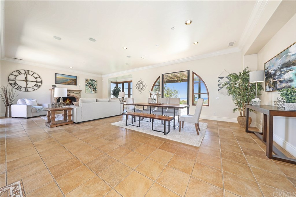 53 Overlook Drive Newport Coast, CA 92657 - Photo 9 of 28 The family room and dining rooms are open and spacious creating a perfect flow for entertaining.