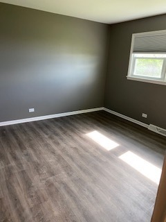 15500 Wolf Road Orland Park, IL 60467 - Photo 3 of 24 an empty room with a window