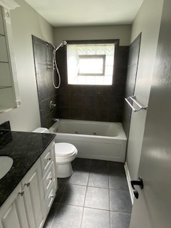 15500 Wolf Road Orland Park, IL 60467 - Photo 10 of 24 a bathroom with a granite countertop sink toilet and shower