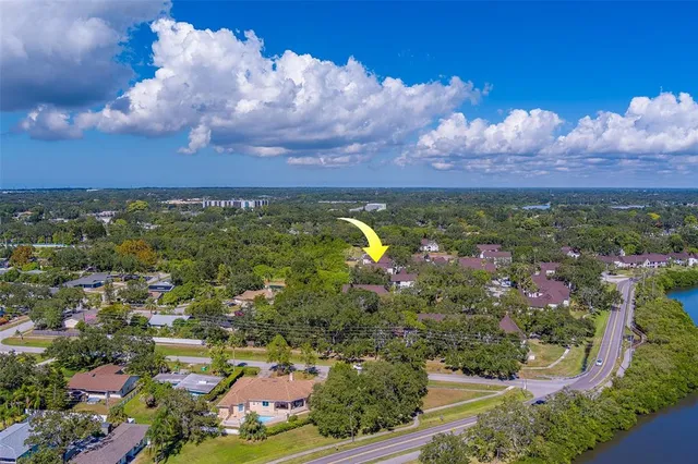 a view of a garden from a lake view