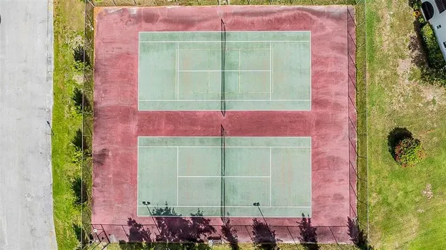 a living room with lots of furniture and a chandelier