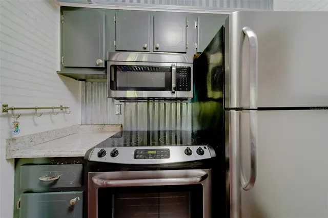 a sink with a granite countertop window