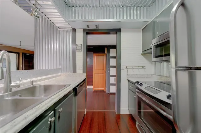 a view of livingroom with furniture and wooden floor