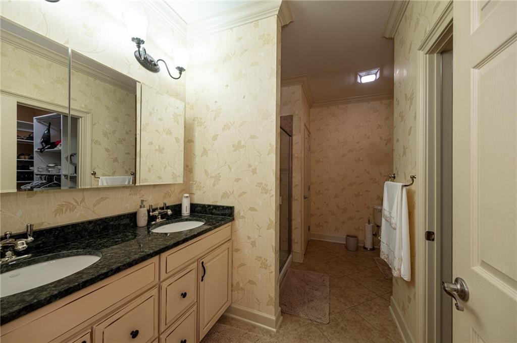 408 Independence Lane Freedom, PA 15042 - Photo 13 of 26 a bathroom with a granite countertop sink and a mirror