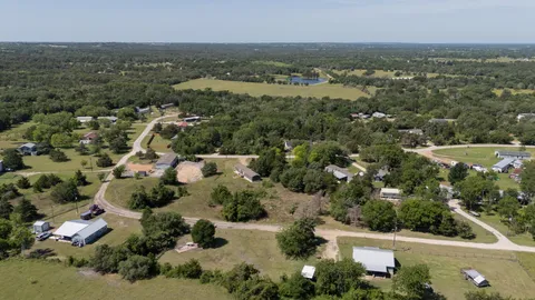 an aerial view of a city with lots of residential buildings