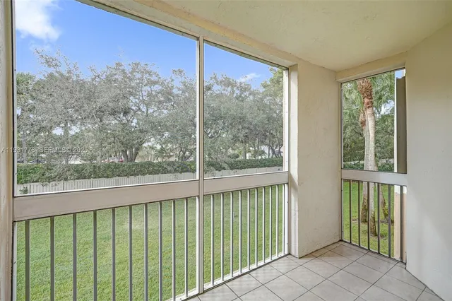 a view of a room with a large window