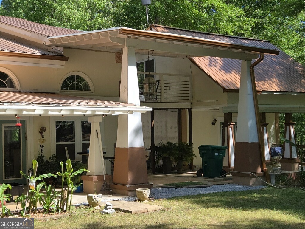 447 Grandview Road Mansfield, GA 30055 - Photo 3 of 65 a front view of a house with garden