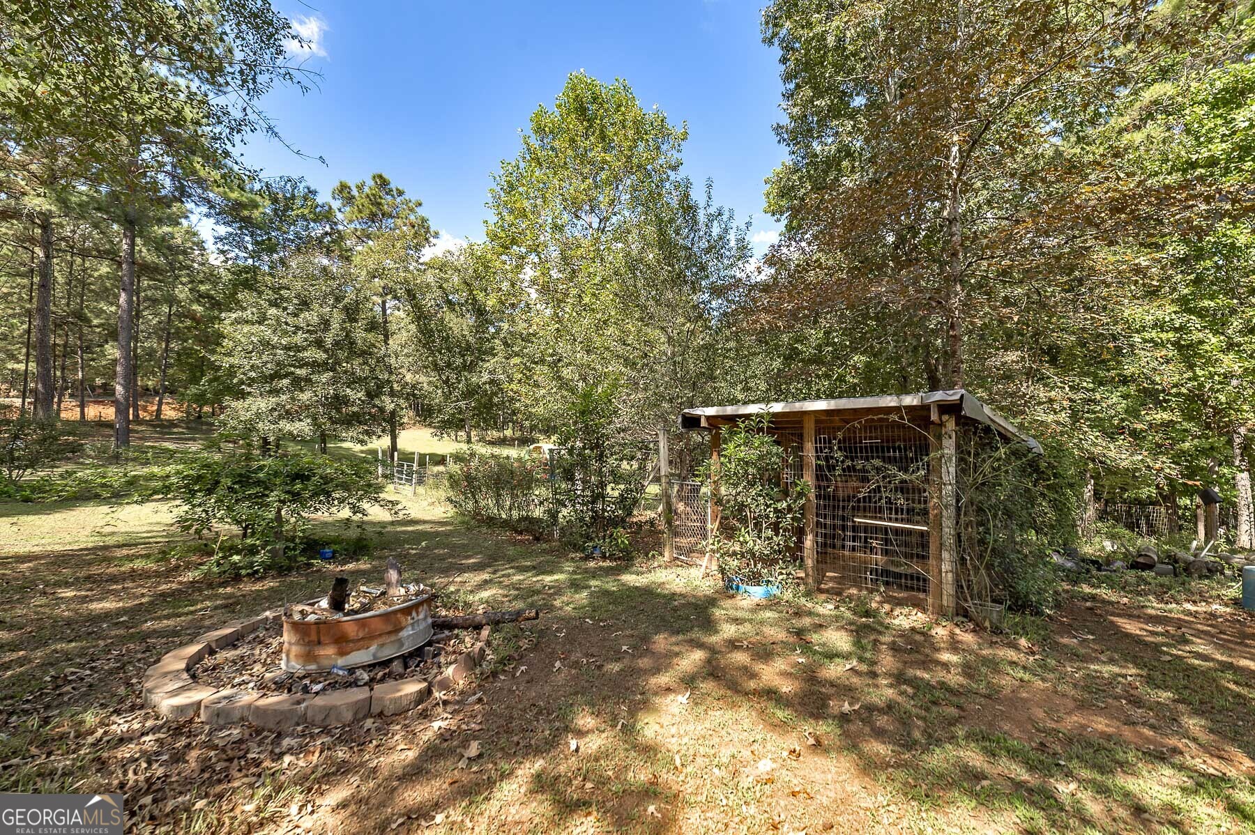 447 Grandview Road Mansfield, GA 30055 - Photo 31 of 65 a backyard of a house with lots of green space